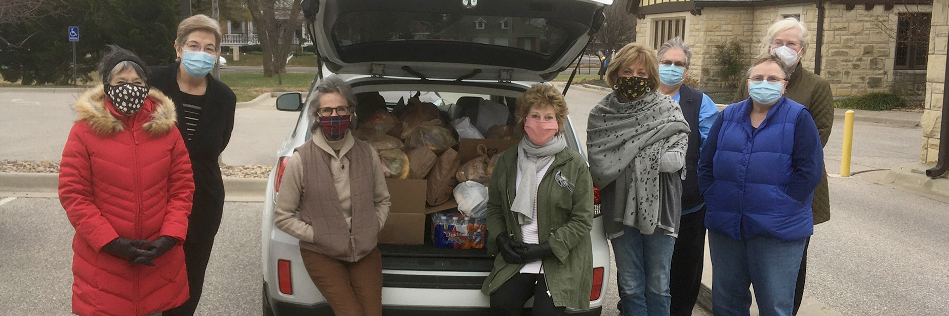 Donors with sacks of food
